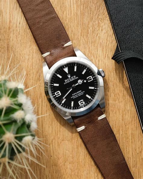 rolex explorer with leather strap.